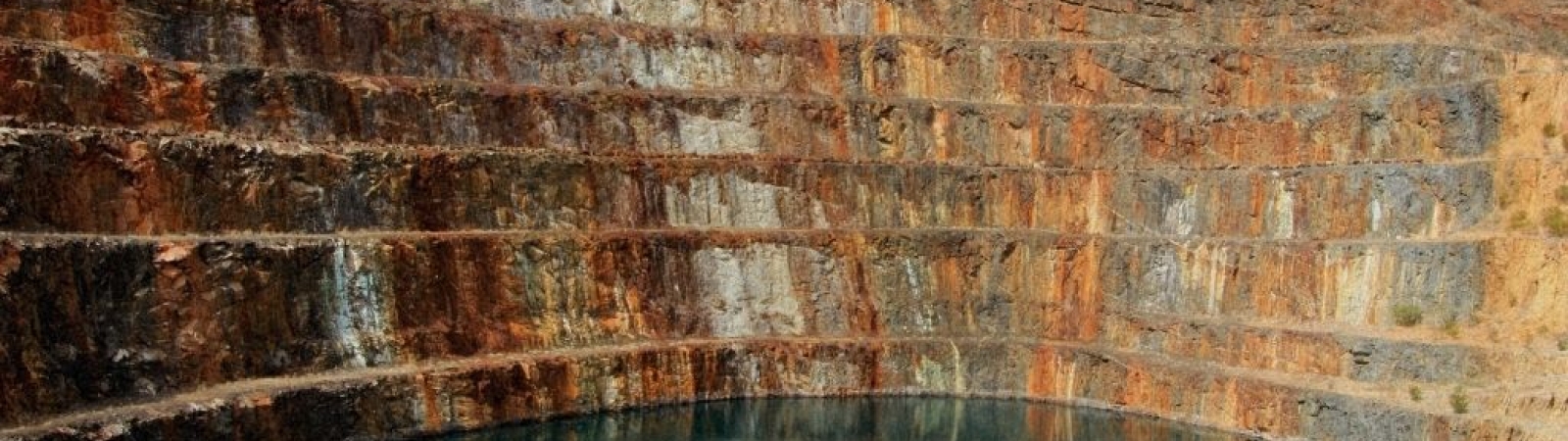 image of a tailings pond from an open pit mine