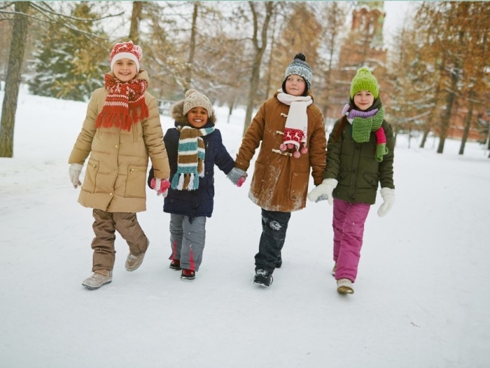 kids walking in the snow